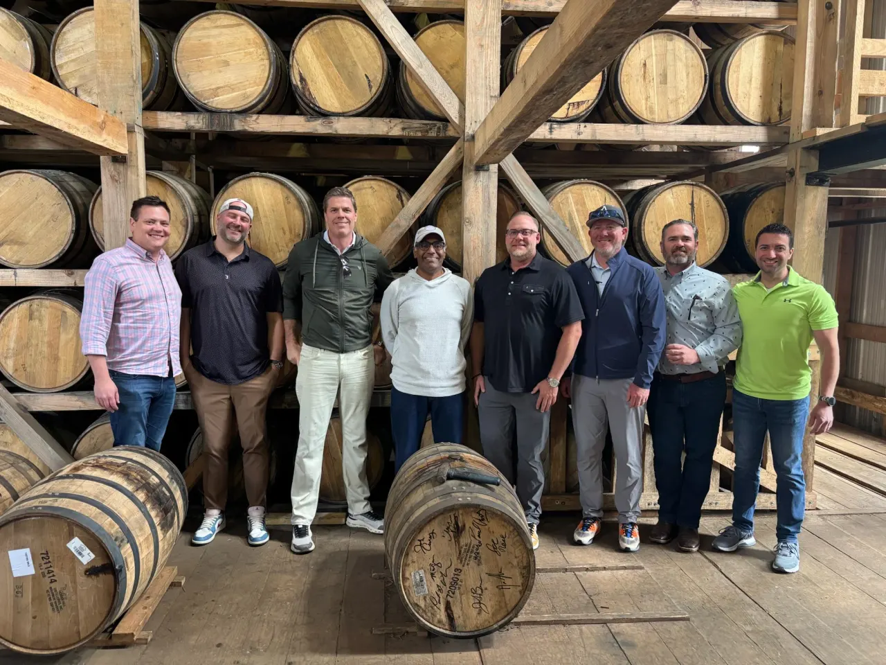 The group in a Heaven Hill barrel room after a selection.