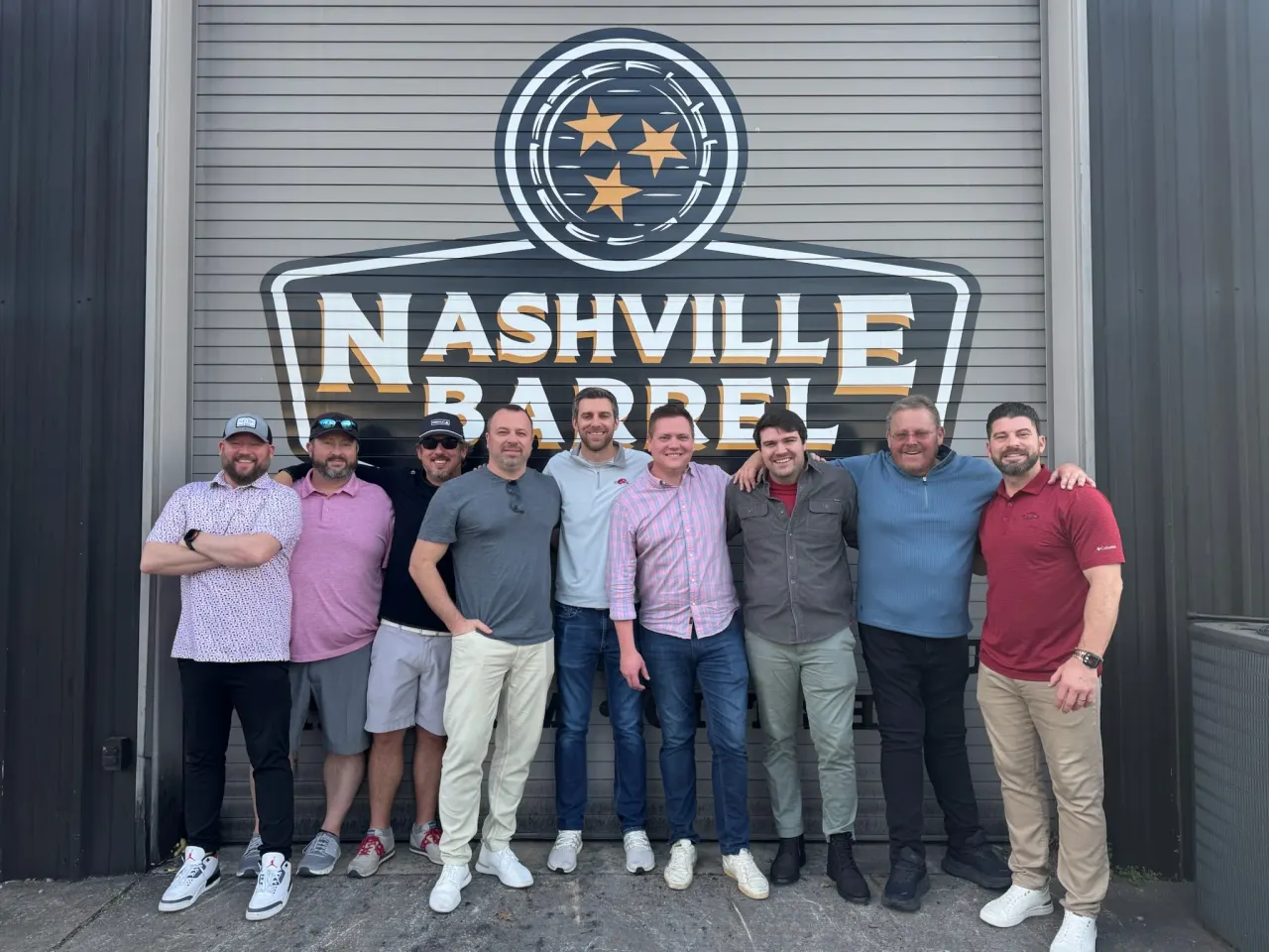 The group together outside Nashville Barrel Company.