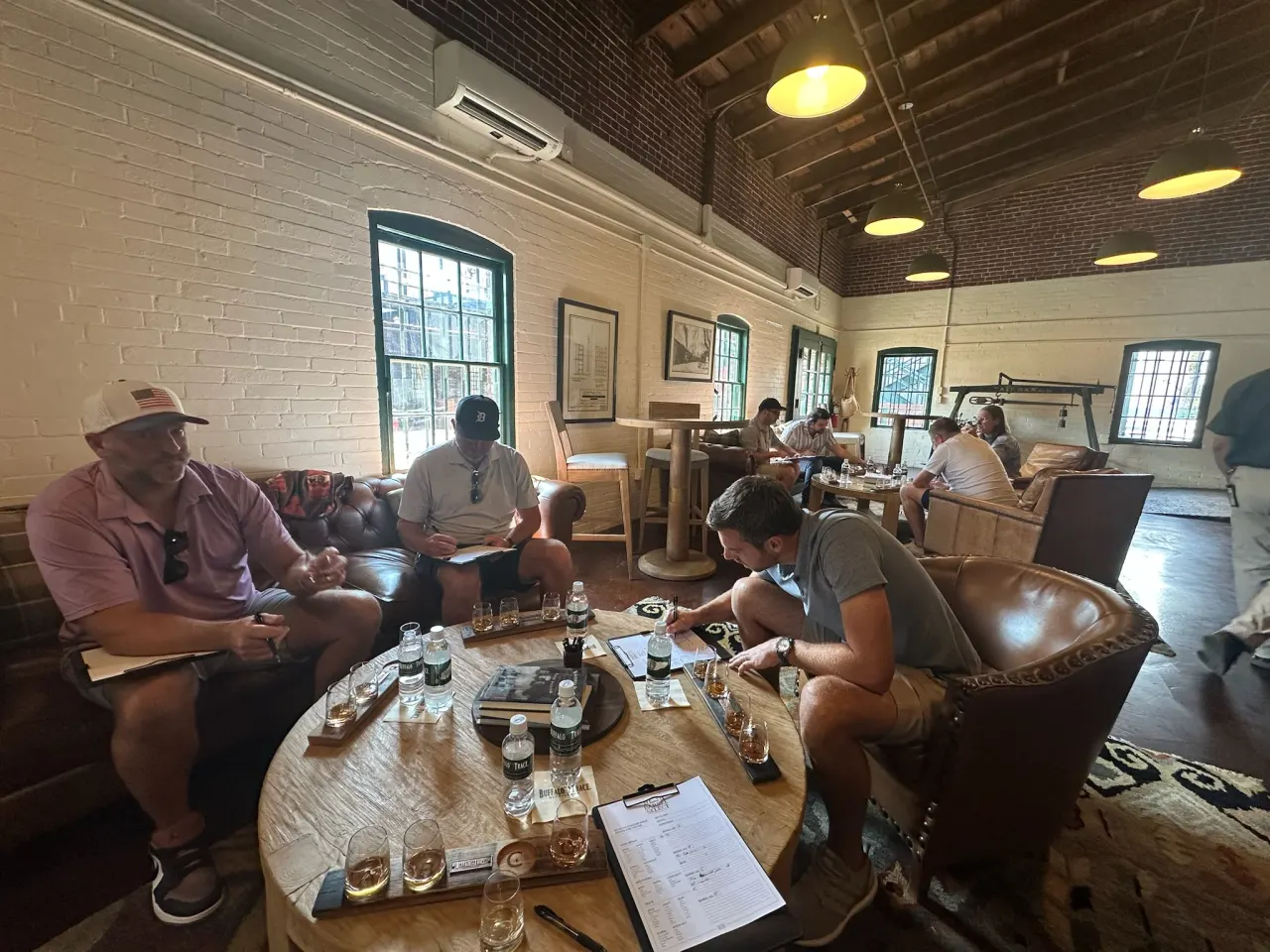 Members gathered around a tasting table during the Stagg selection trip.